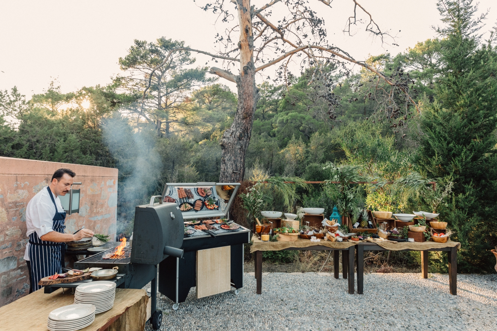 Barbecue at a popup restaurant with a variety of salads, meats and other delicious food at luxury hotel Amanruya, Turkey
