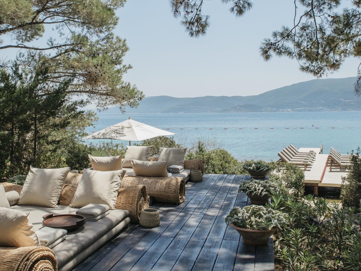 Lounging deck overlooing the sea at the Beach Club at luxury hotel Amanruya, Turkey