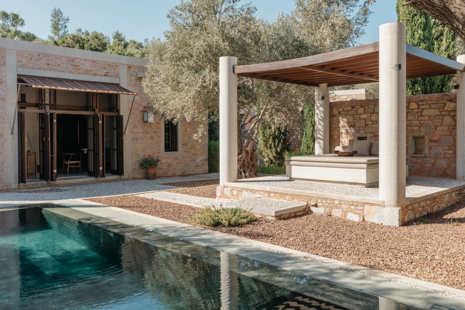 Shaded pool cabana at a pool pavilion at luxury hotel Amanruya, Turkey