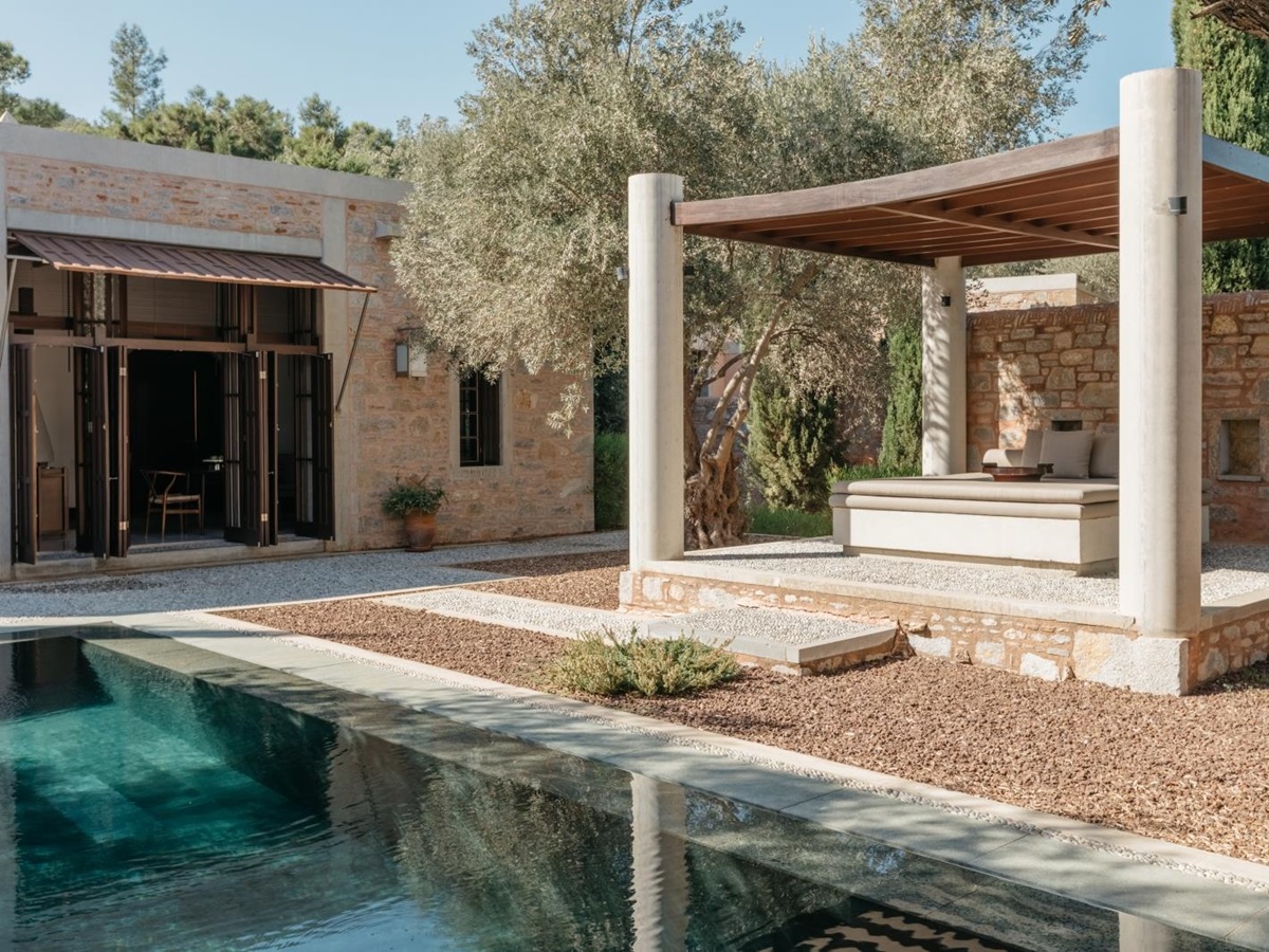 Shaded pool cabana at a pool pavilion at luxury hotel Amanruya, Turkey