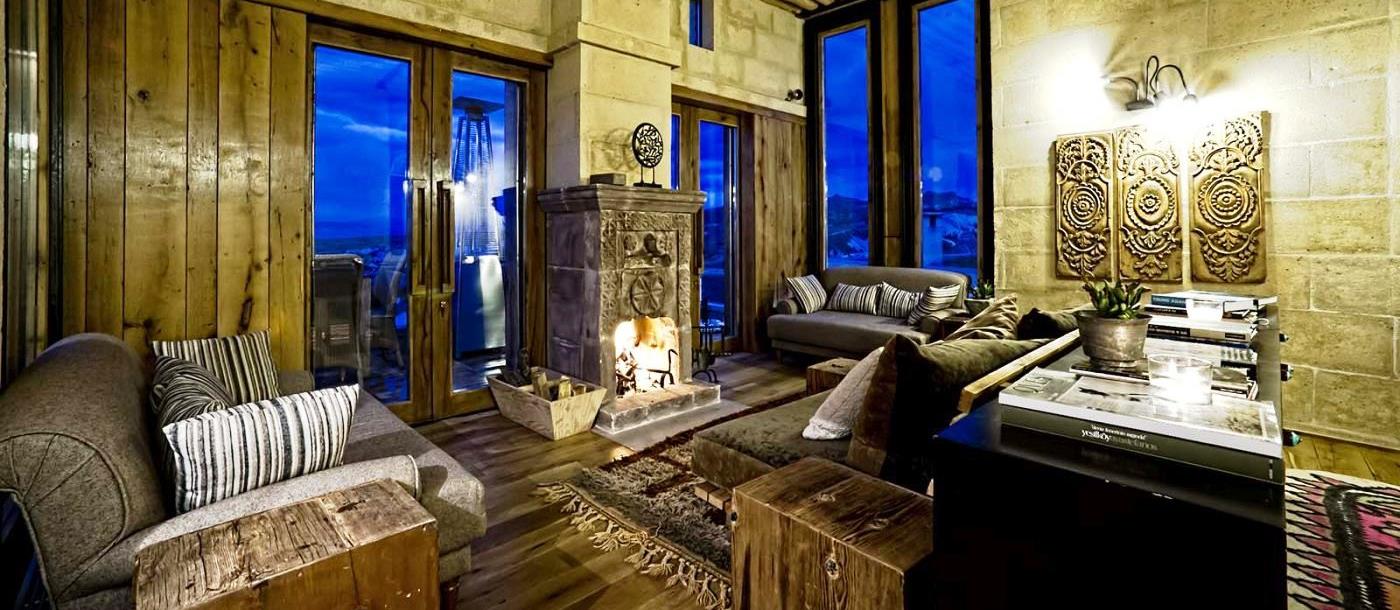 The living area with open fire in the hotel Argos in Cappadocia in Turkey