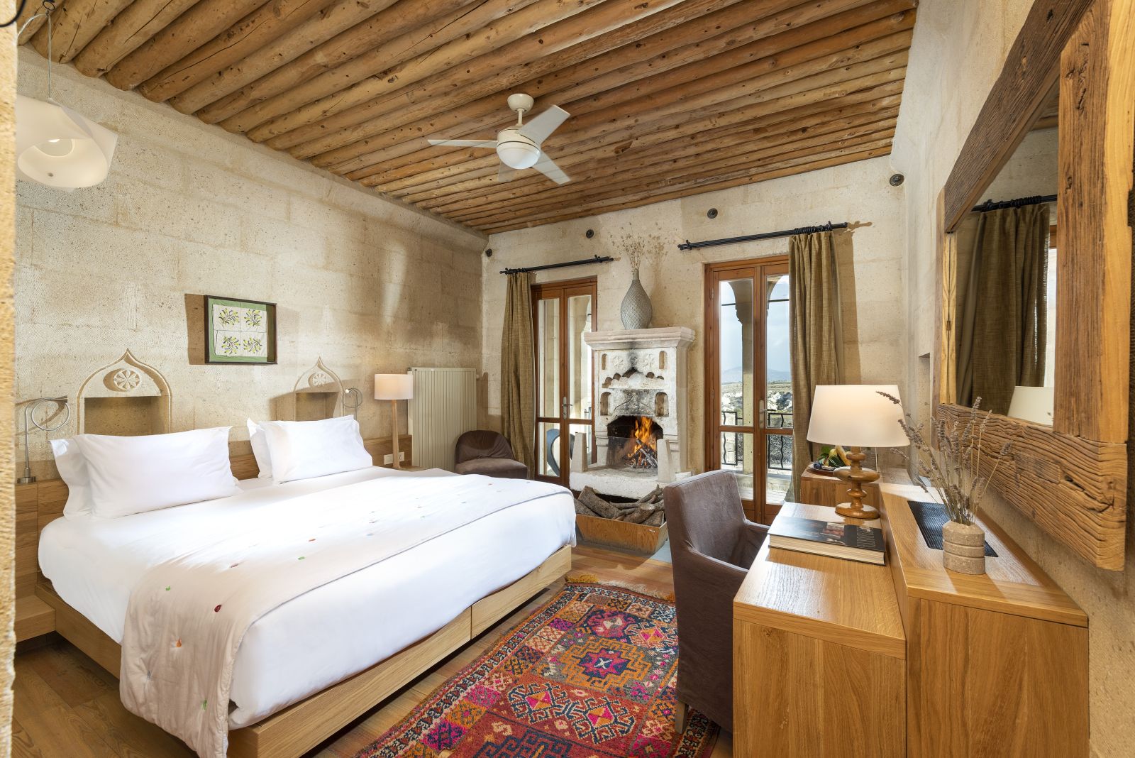 Guest room with fireplace at the Argos in Cappadocia hotel Turkey