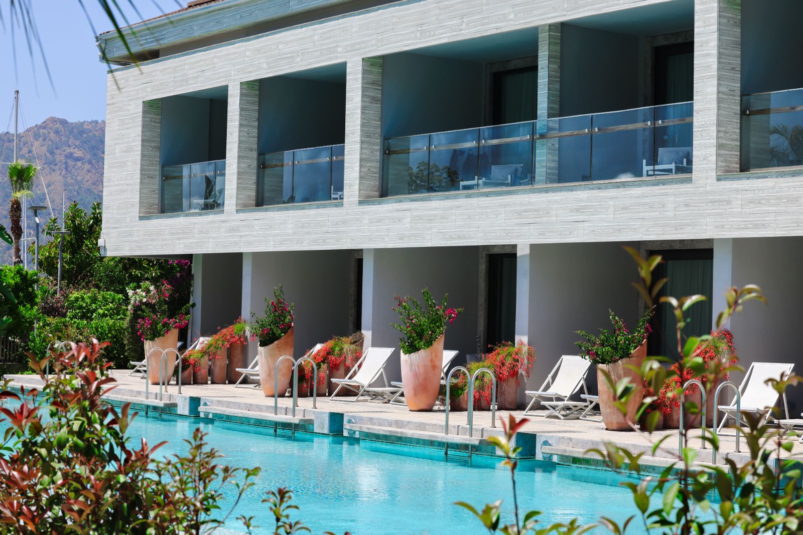 Swimming pool and hotel exterior at D-Resort Gocek in Turkey