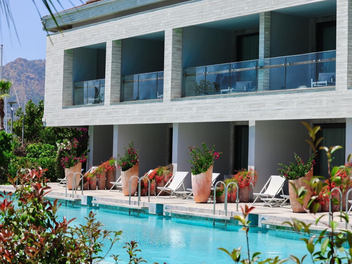 Swimming pool and hotel exterior at D-Resort Gocek in Turkey