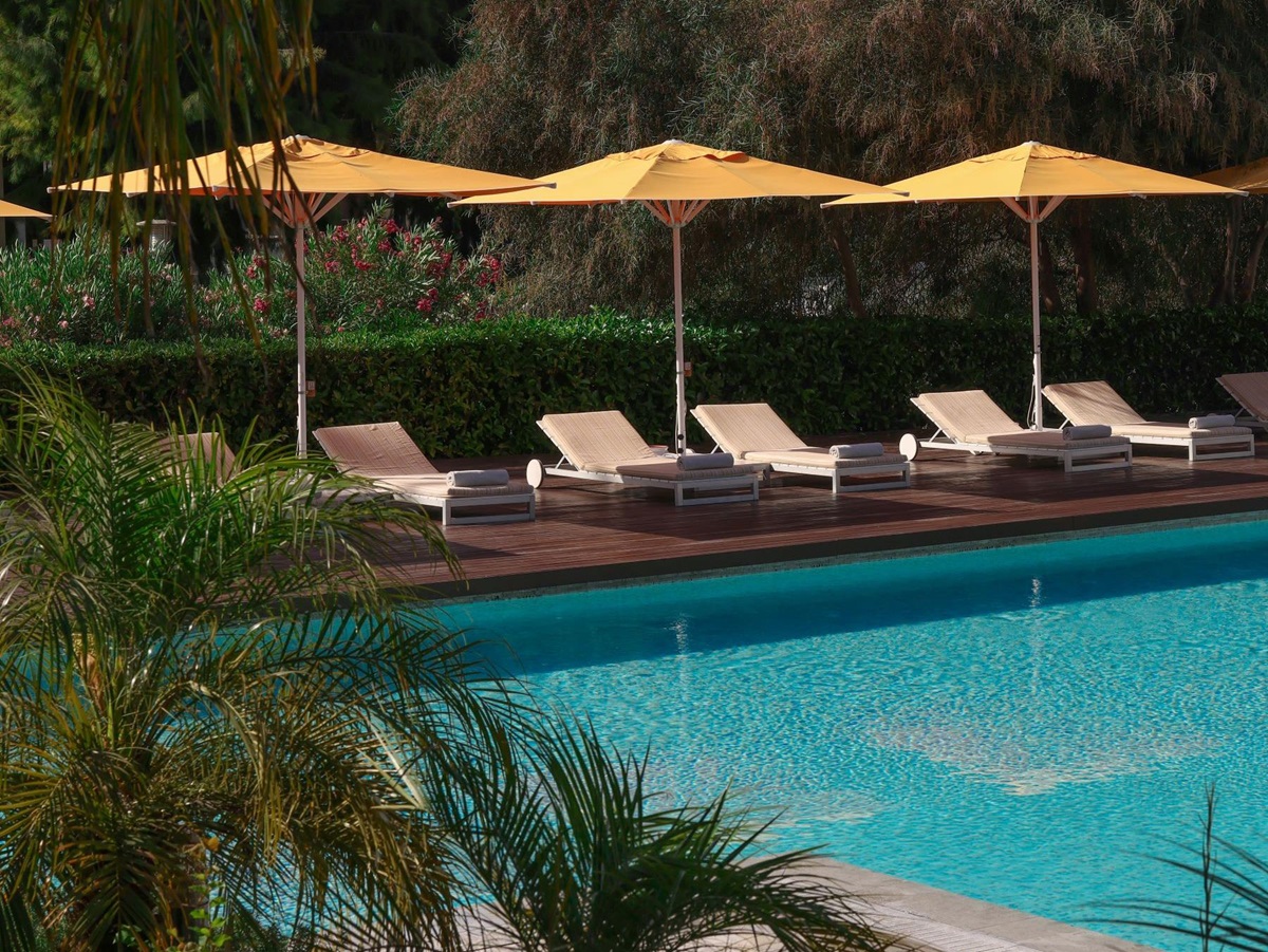 Swimming pool with loungers at D-Resort Gocek in Turkey