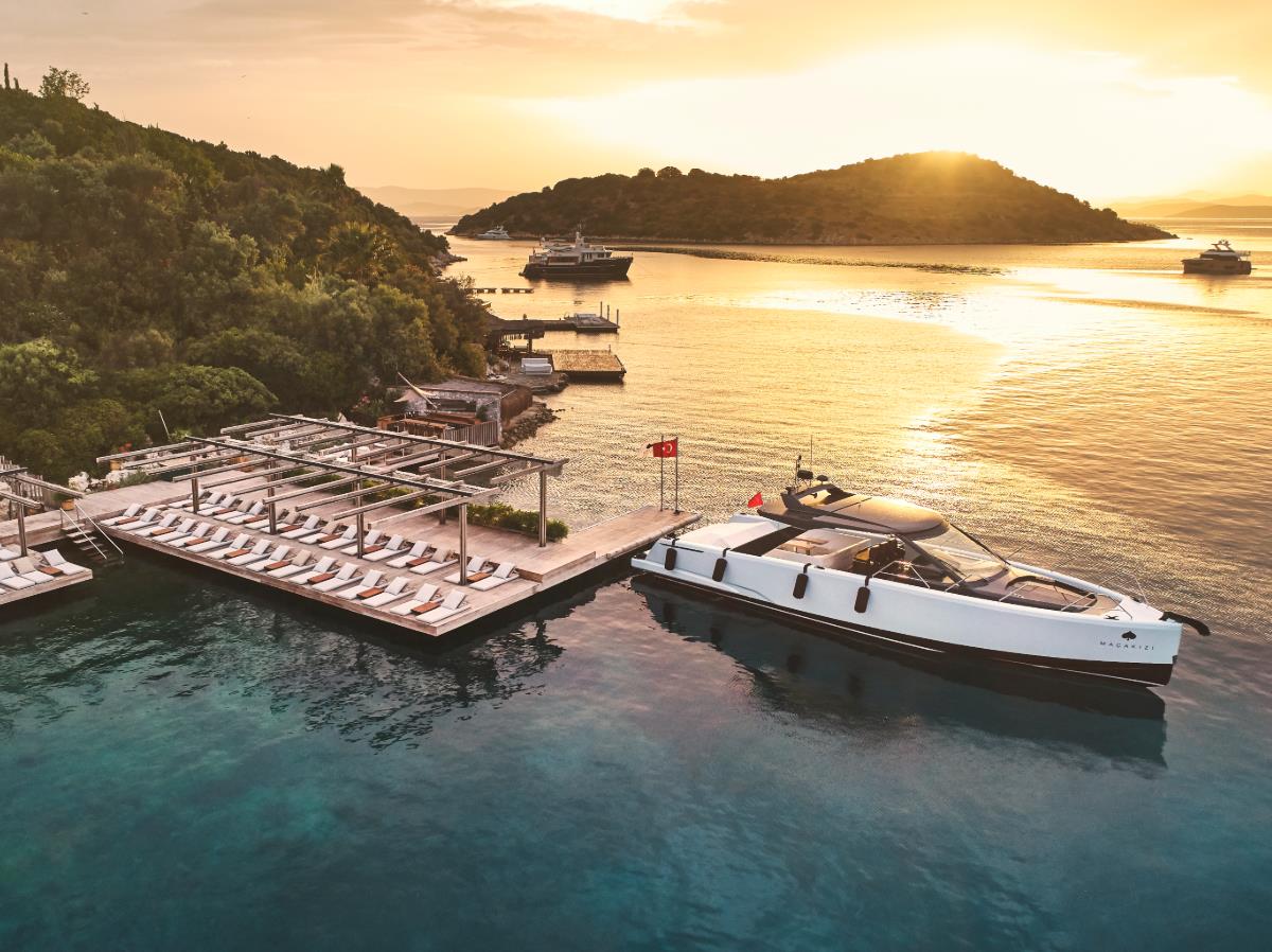 Macakizi's waterfront deck and private boat in Turkey