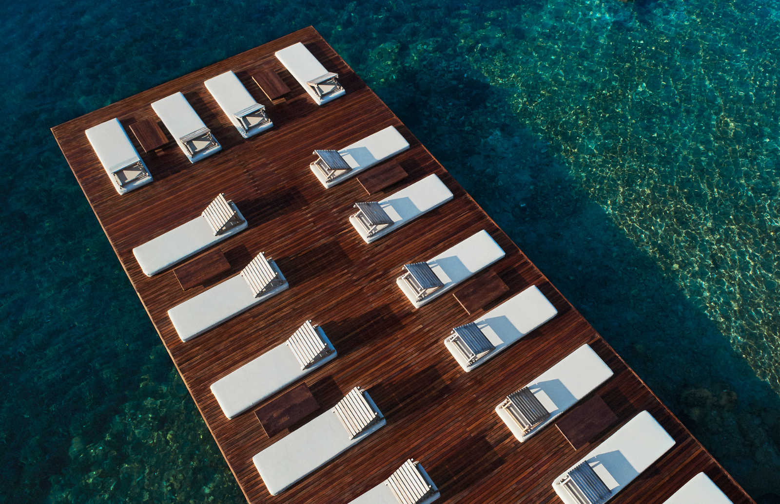 Waterfront sun terrace with loungers at Macakizi hotel Turkey