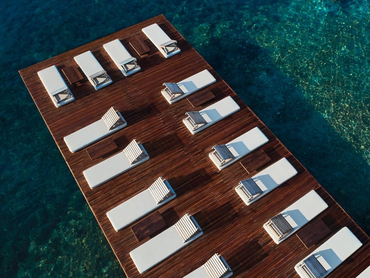 Waterfront sun terrace with loungers at Macakizi hotel Turkey