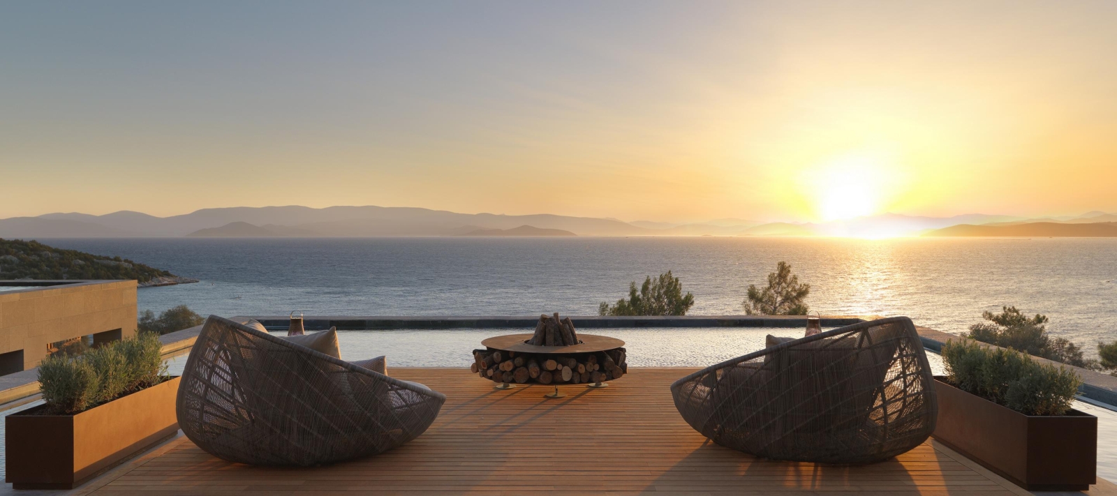 Deck with firepit overlooking ocean at  Mandarin Oriental Bodrum