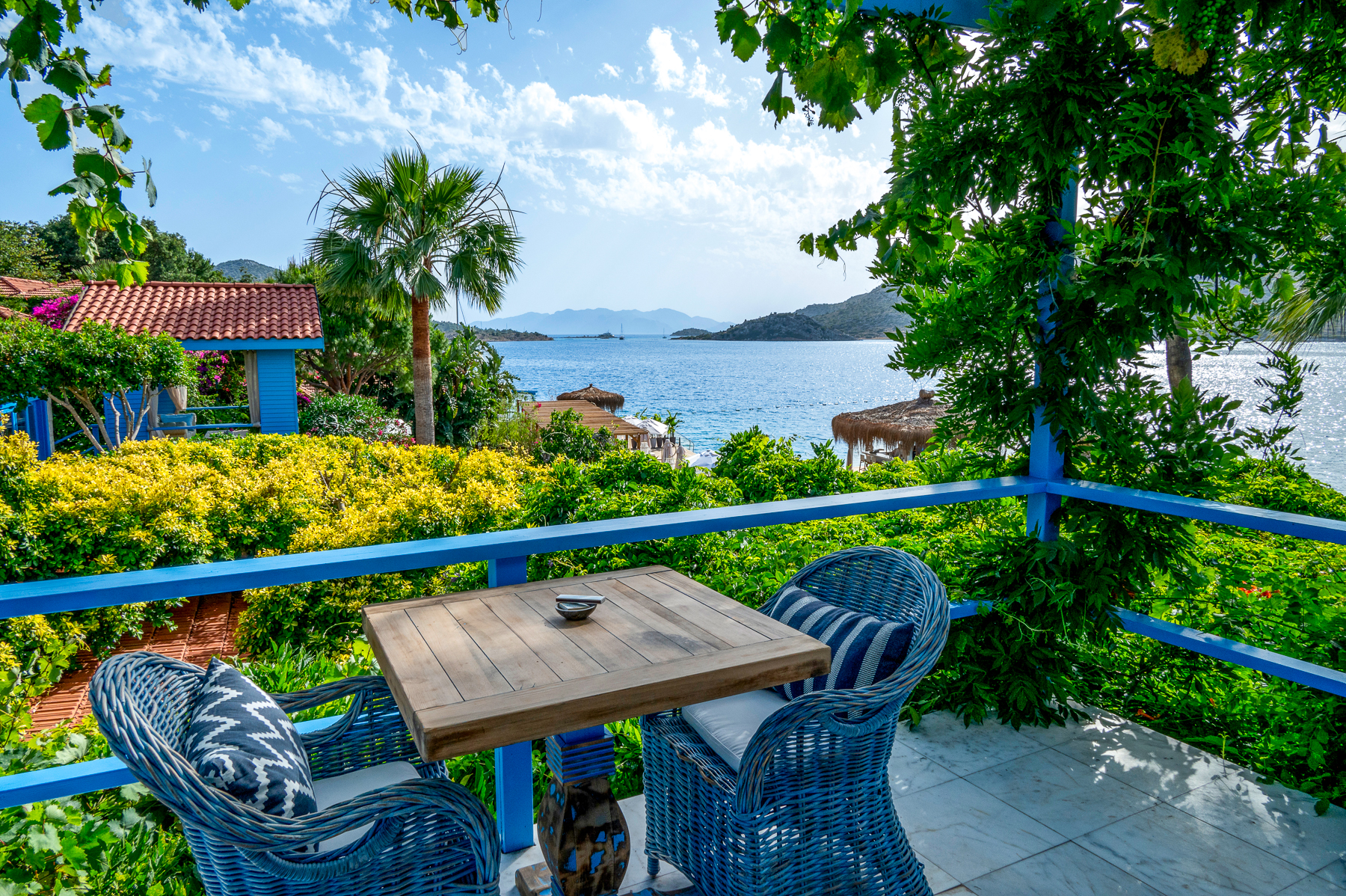 Balcony with table and chairs at Sabrina's Haus luxury hotel in Turkey