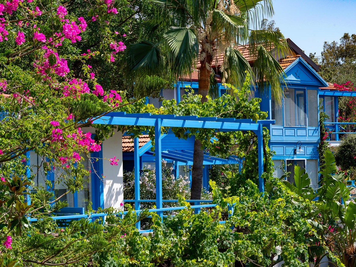 Facade and gardens of Sabrina's Haus luxury hotel in Turkey