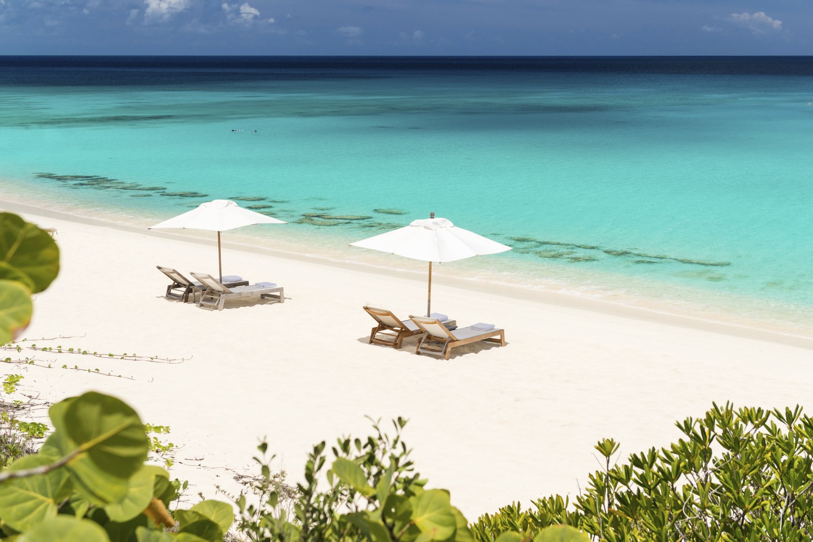 Two sunloungers at the beach of Amanyara, Turks and Caicos Islands