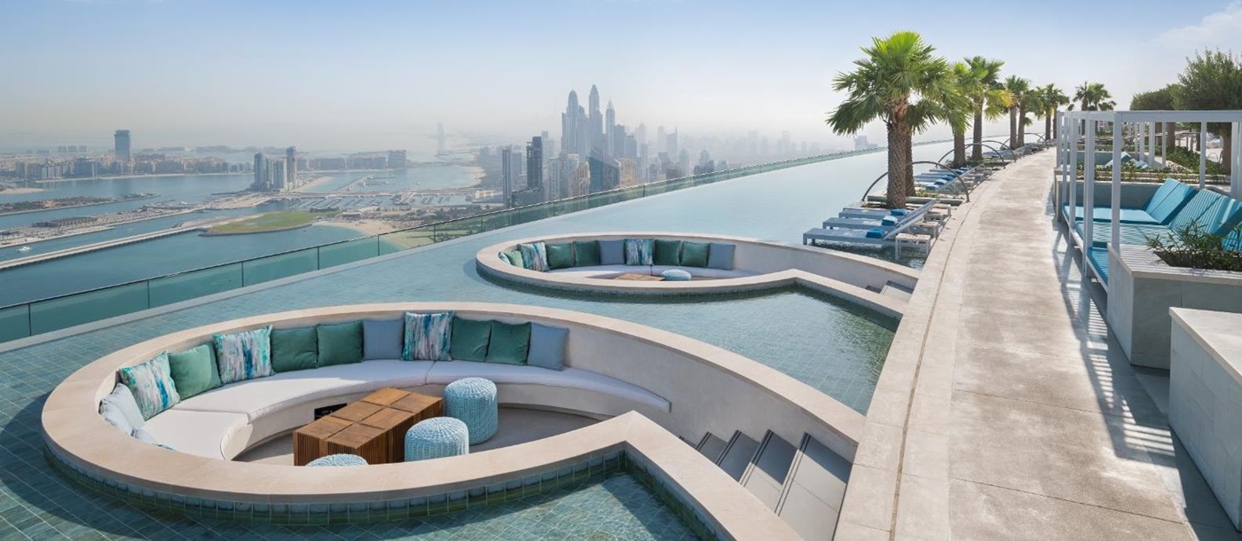 Sunken seating area at the 77th floor pool at luxury resort Address in Dubai