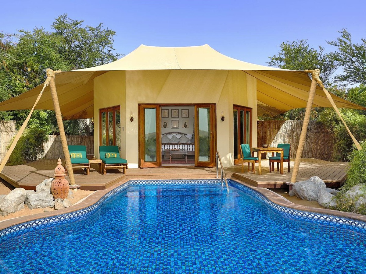 Tent exterior and pool at Al Maha A Luxury Collection Desert Resort & Spa in Dubai
