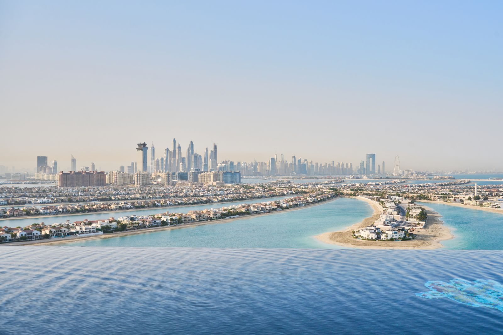 View of the Palm Jumeirah from Cloud 22 infinity pool at Atlantis The Royal in Dubai
