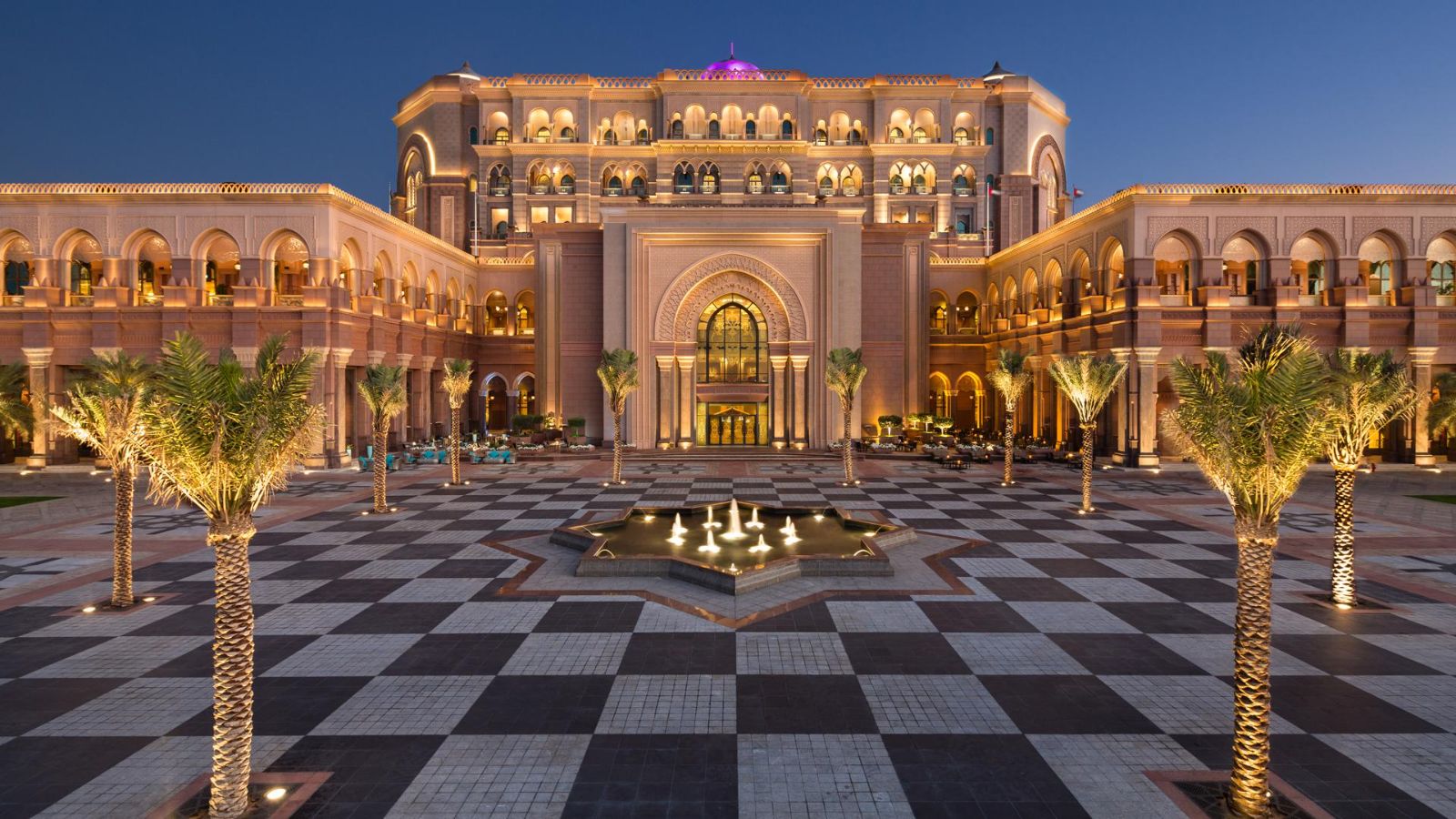 Exterior of Emirates Palace Mandarin Oriental in Abu Dhabi at dusk