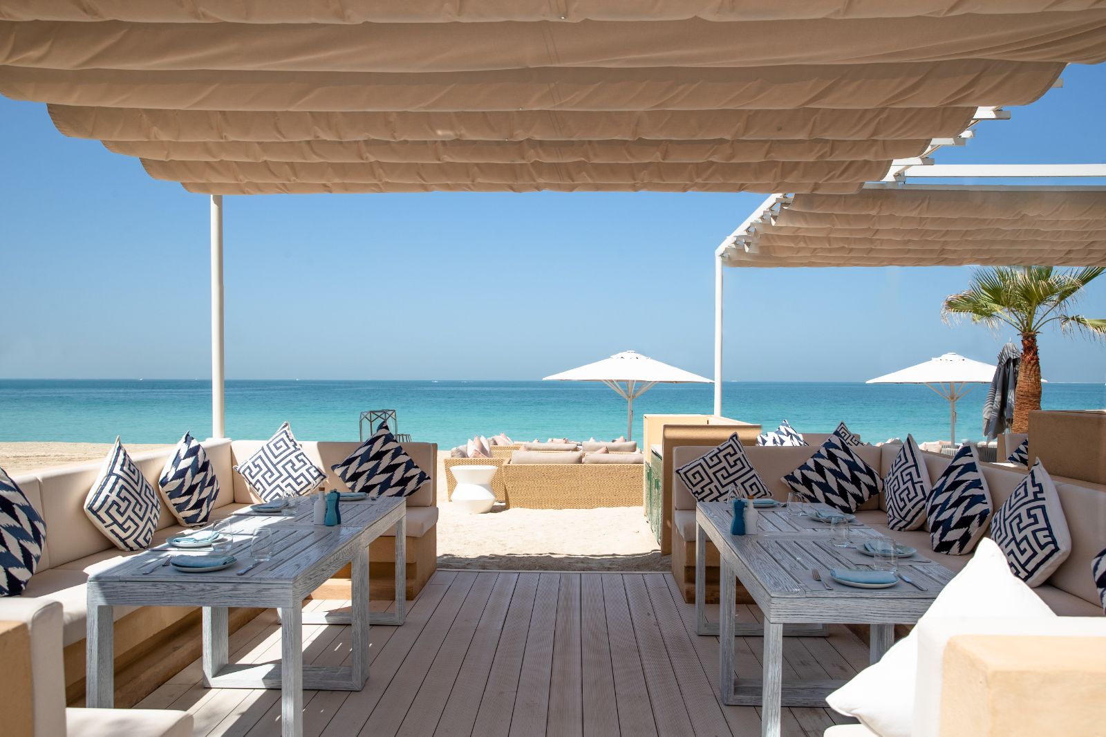Beach bar white sands and turquoise sea at Jumeirah Mina A Salam hotel in Dubai