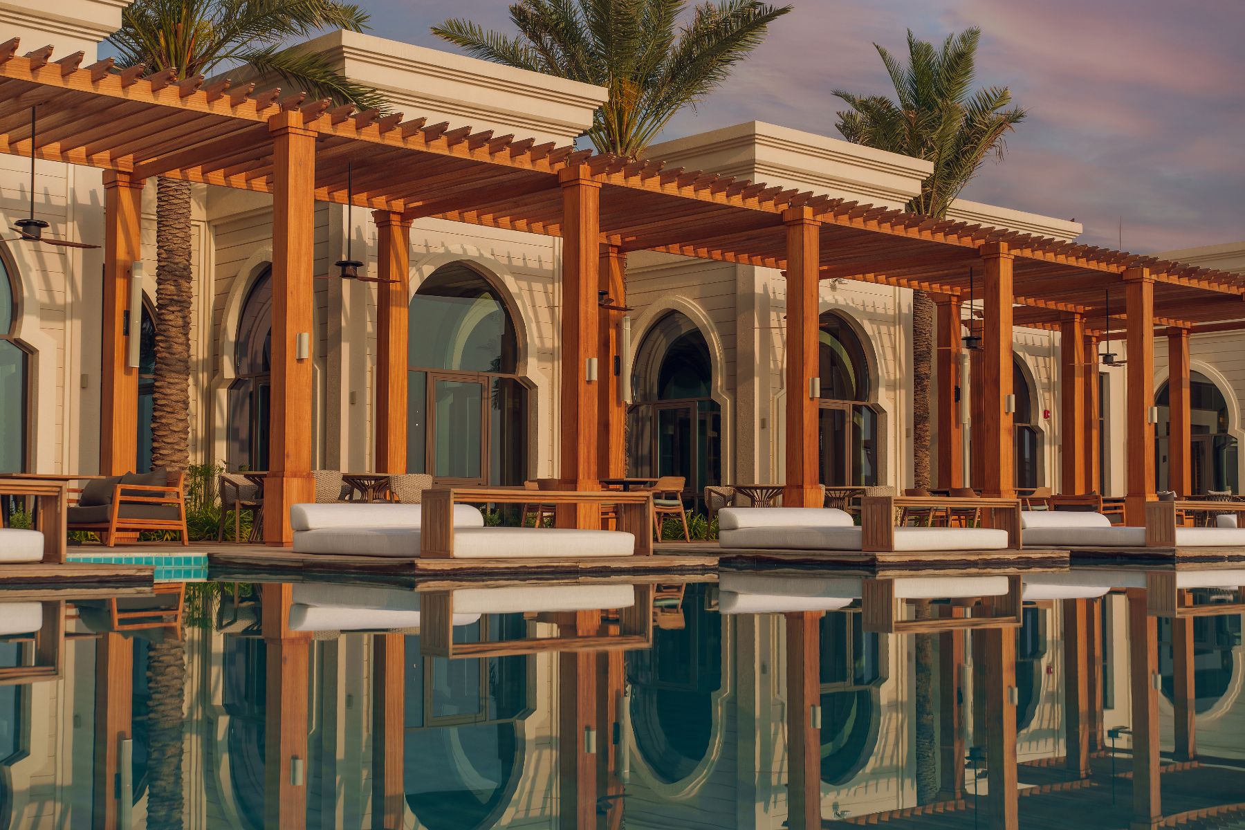 Swimming pool and exterior of Aseelah Restaurant at Naama Beach Villas & Spa in Al Aqah, Fujairah