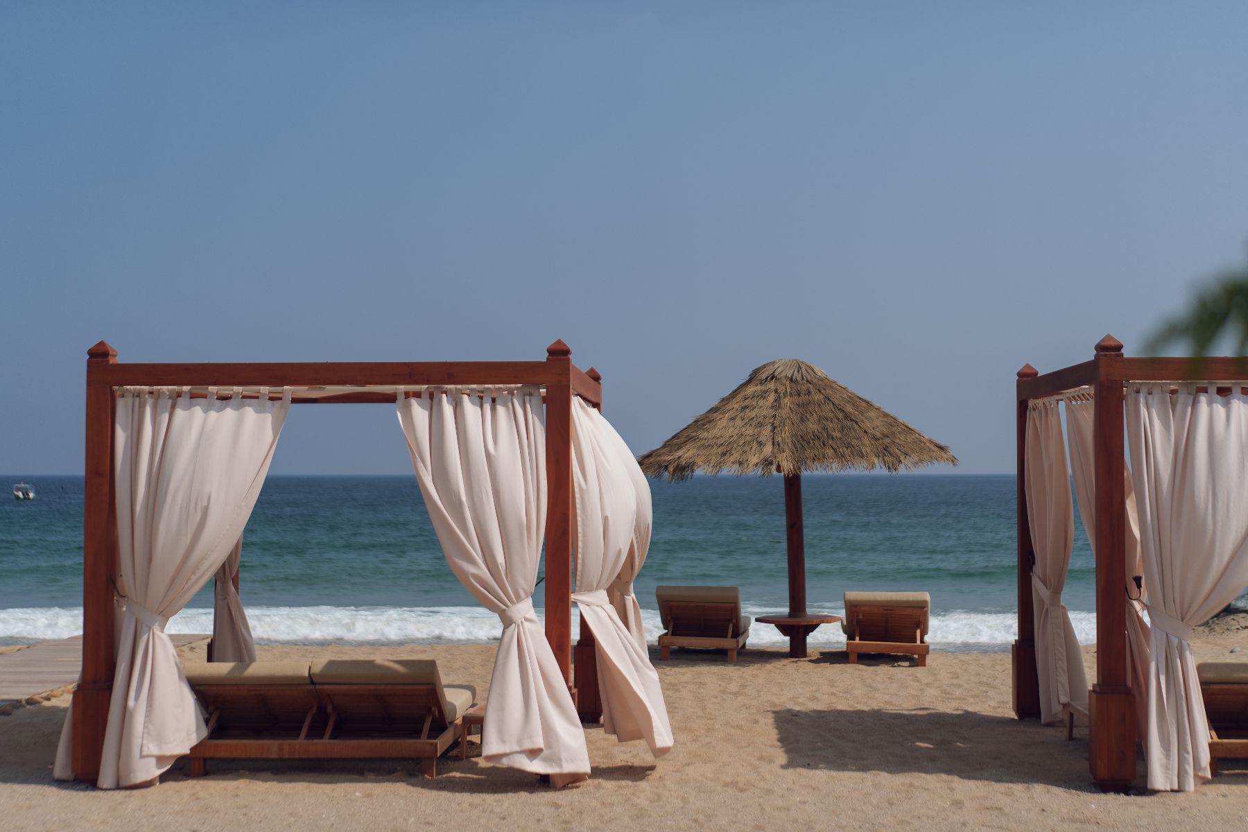 Beach cabanas at Naama Beach Villas & Spa in Al Aqah, Fujairah