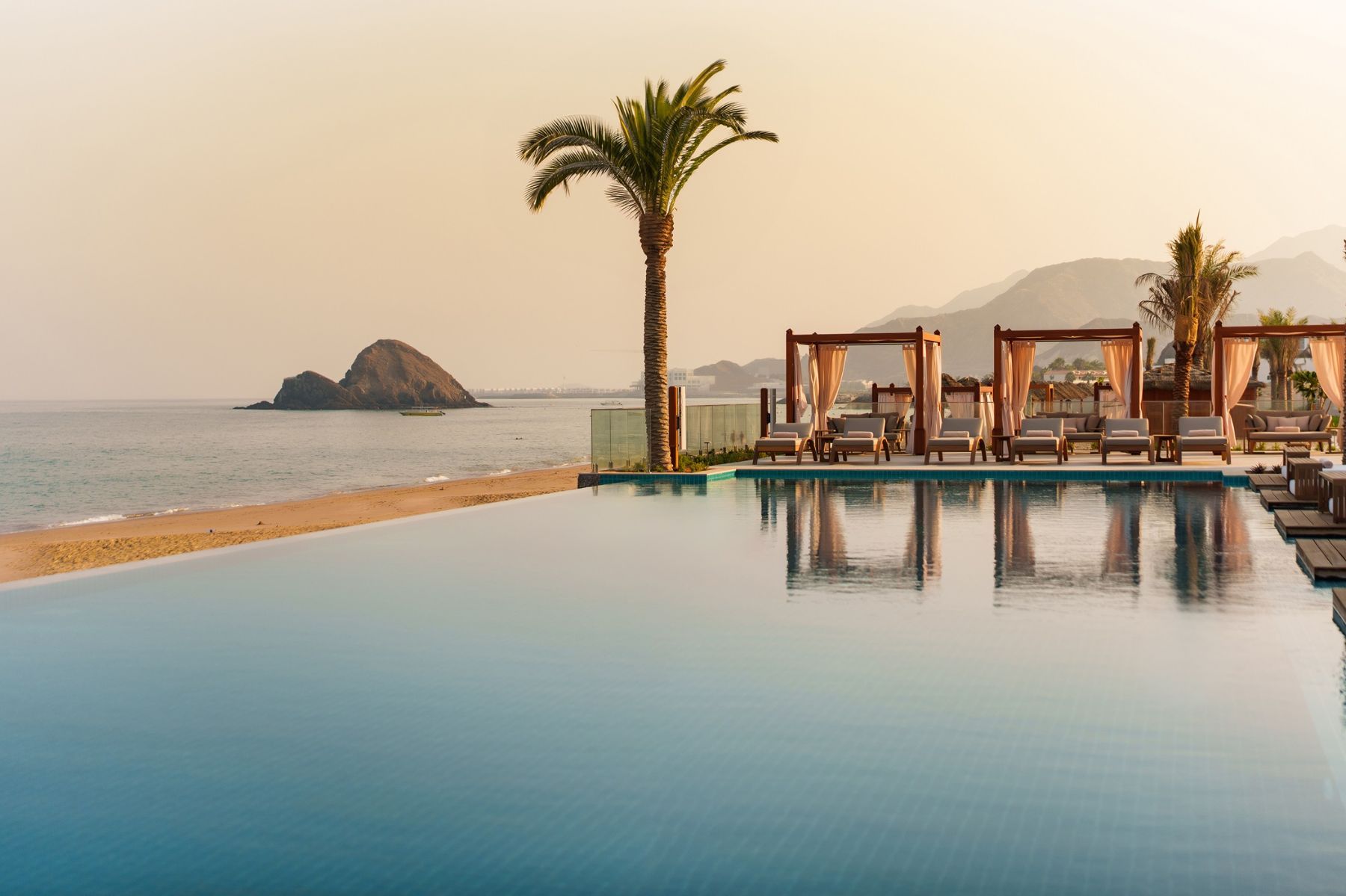 Infinity pool with Indian Ocean views at Naama Beach Villas & Spa in Al Aqah, Fujairah