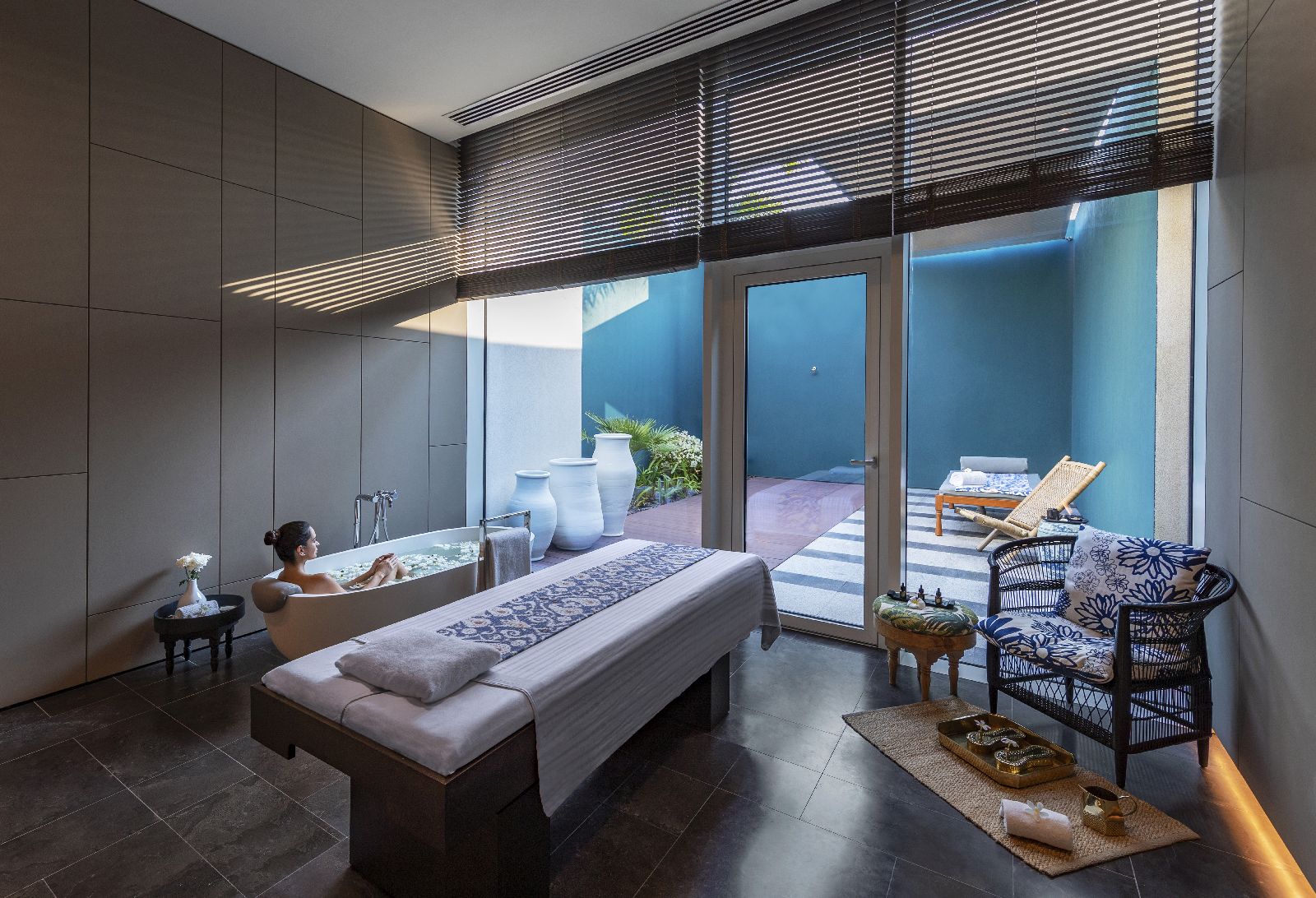 Treatment room with private tranquillity area at luxury beach resort The Oberoi Al Zorah in the United Arab Emirates