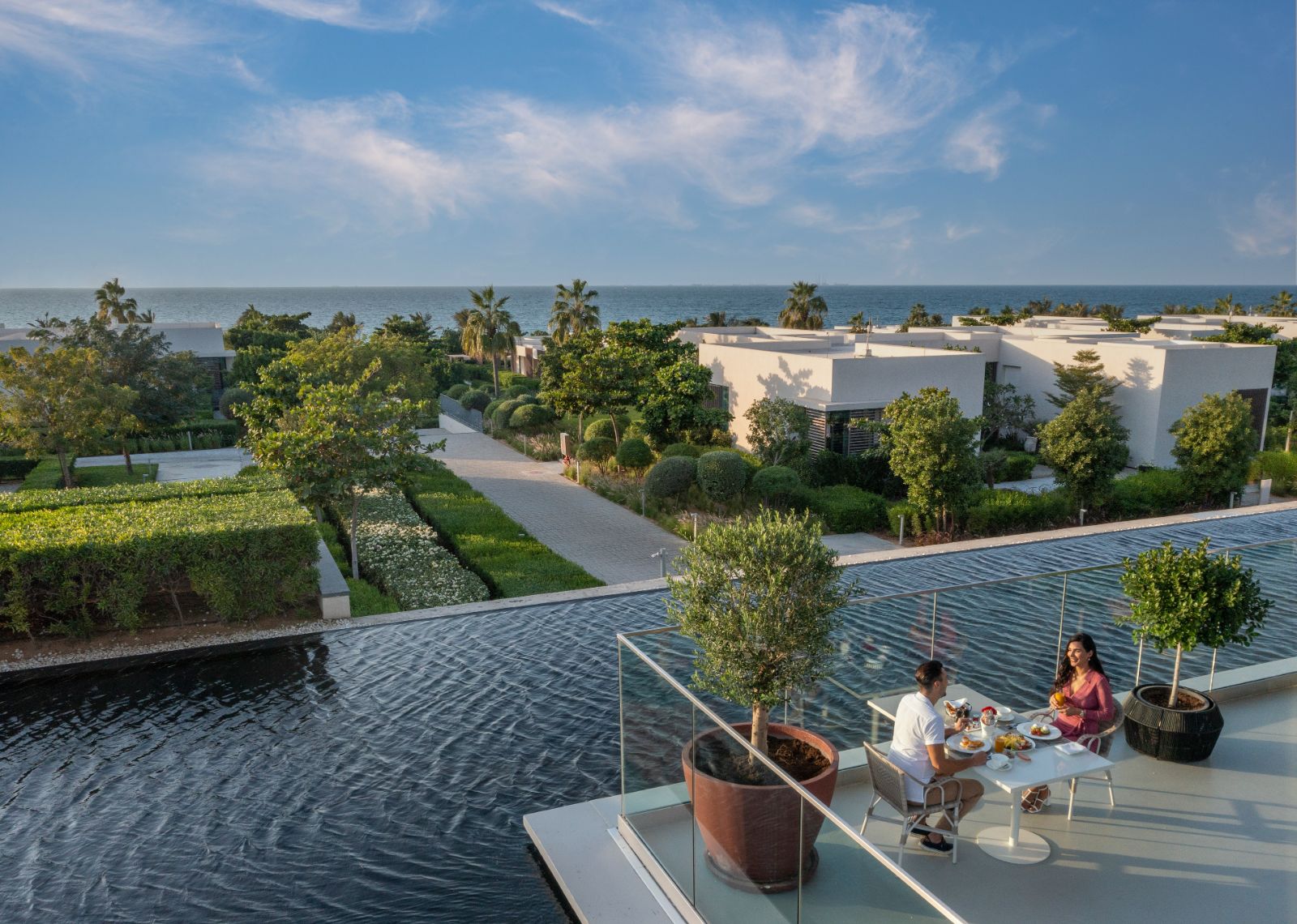 Terrace dining at Vinesse restaurant at luxury beach resort The Oberoi Al Zorah in the United Arab Emirates