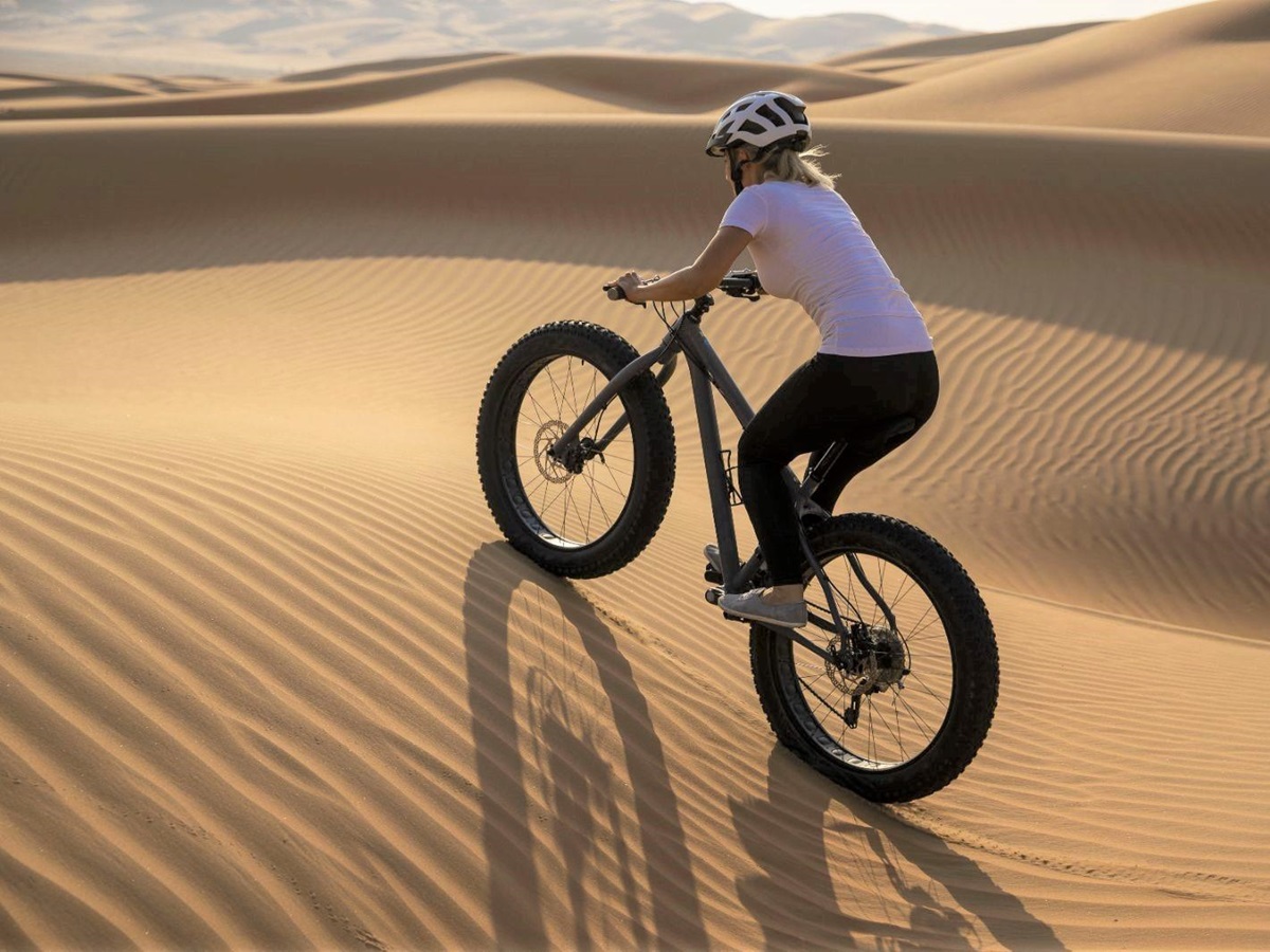 Fat biking in the Liwa Desert near Qasr Al Sarab Desert Resort in the United Arab Emirates