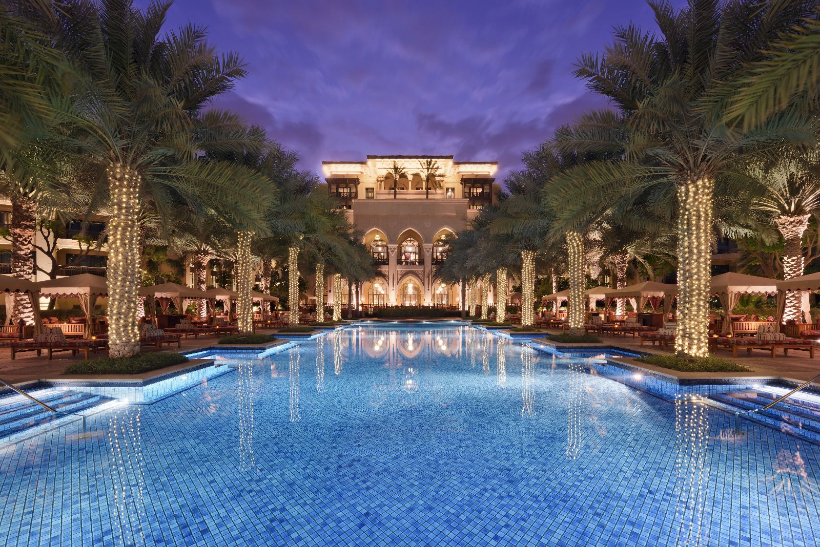 The pool at The Palace Downtown Dubai at night