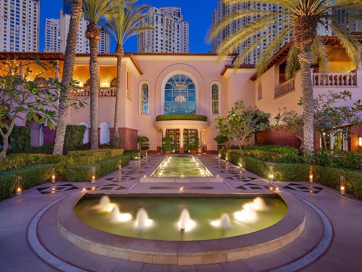 Exterior view of The Ritz Carlton Dubai at dusk