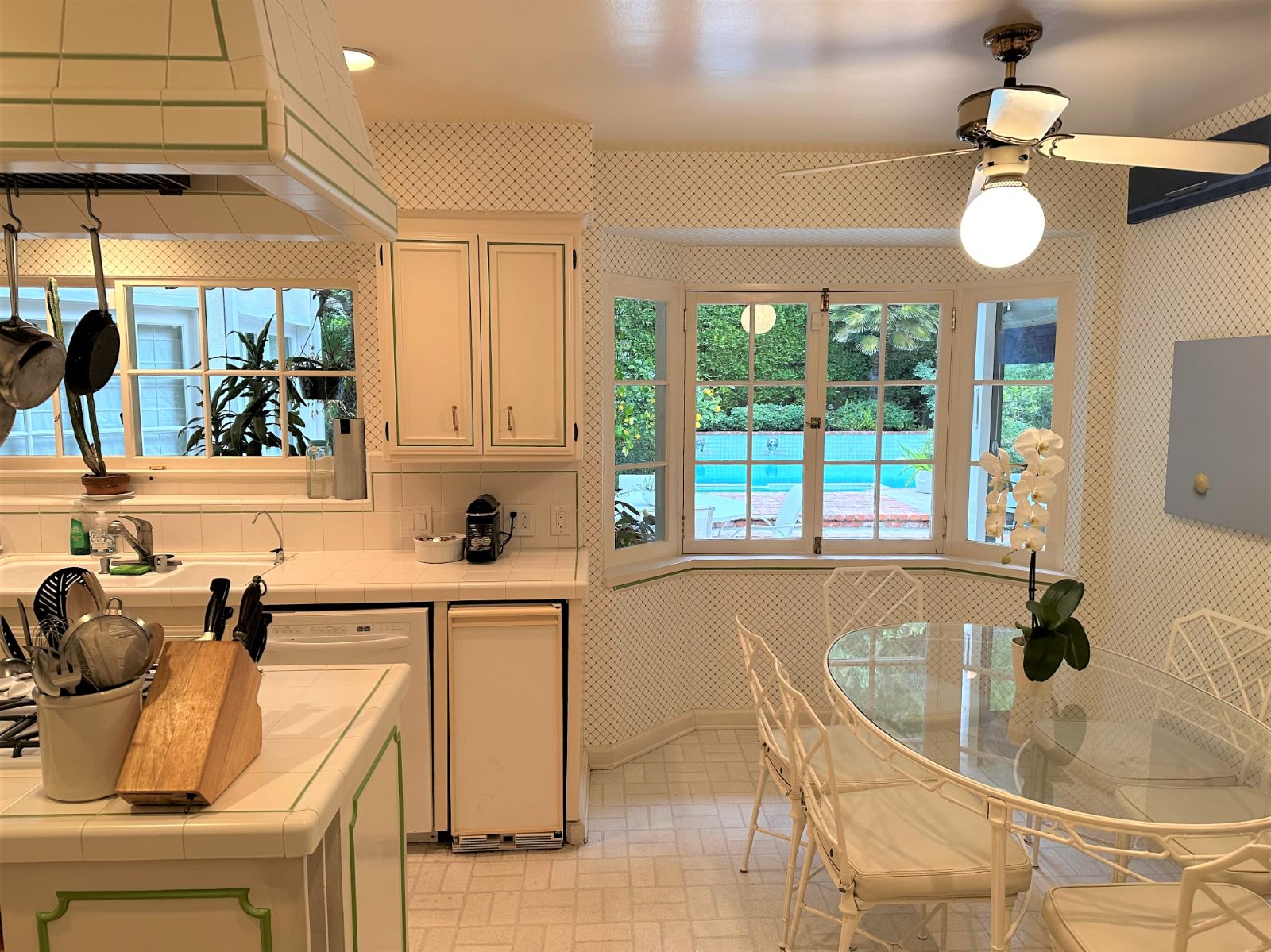 Kitchen diner area at Flicker Way Estate villa in Los Angeles, USA