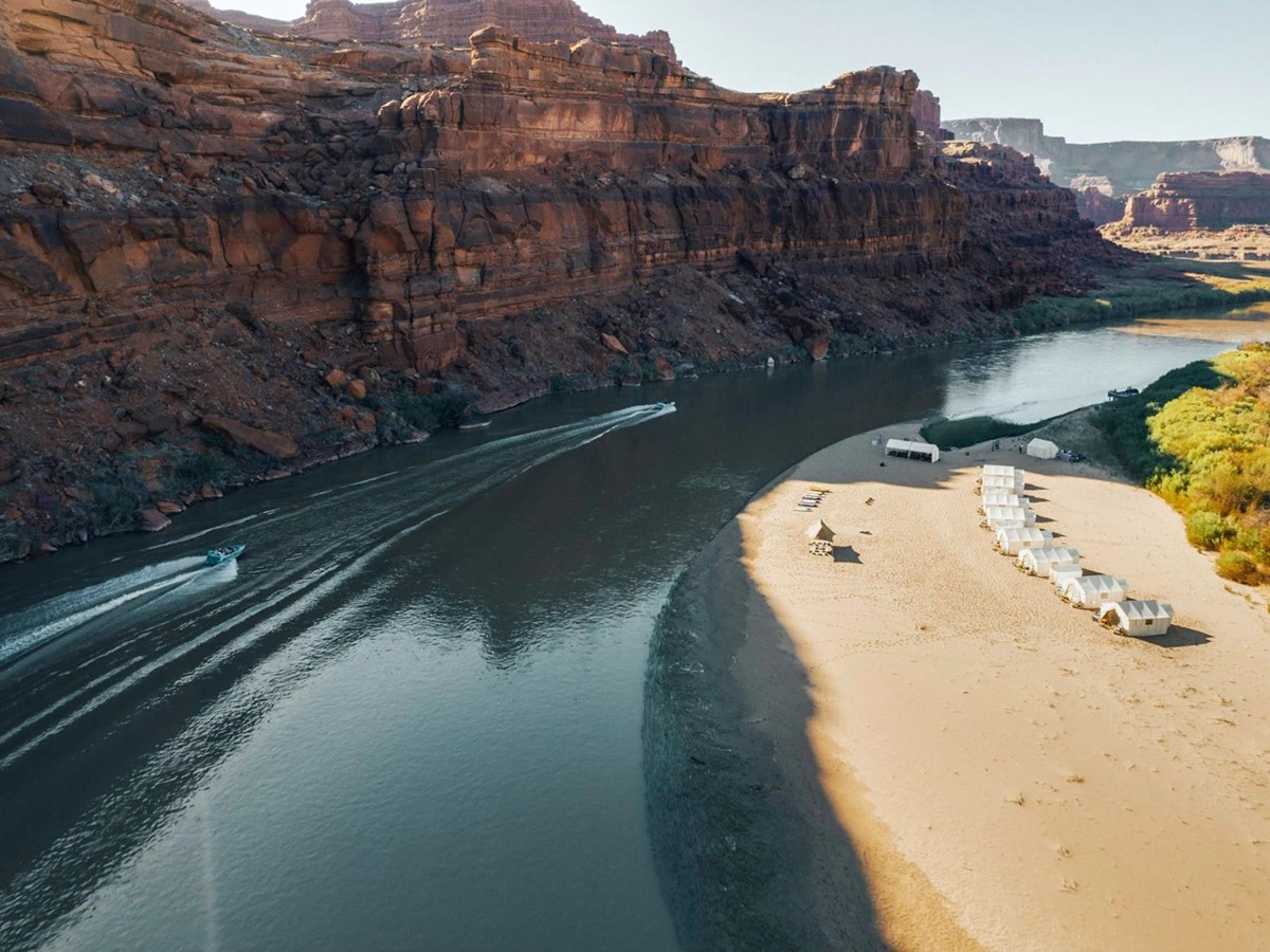 Aerial view of an EXP Journeys mobile camp set up on the banks of the Colorado River