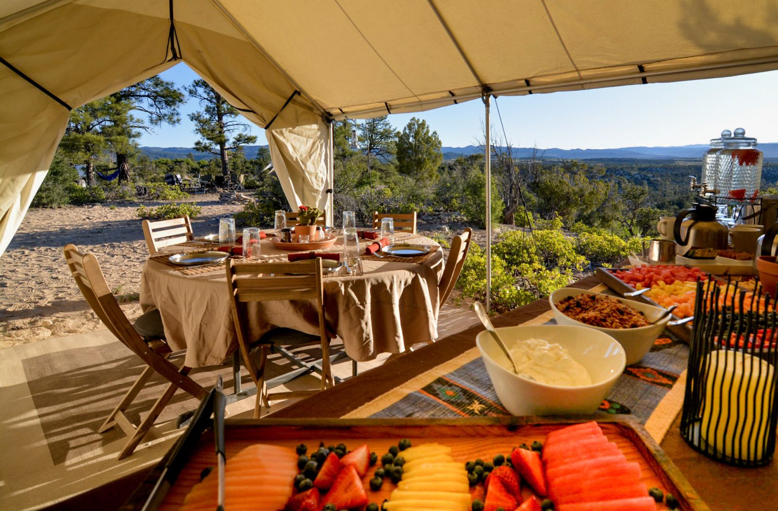 Buffet breakfast at a private campsite with panoramic views over Yellowstone National Park