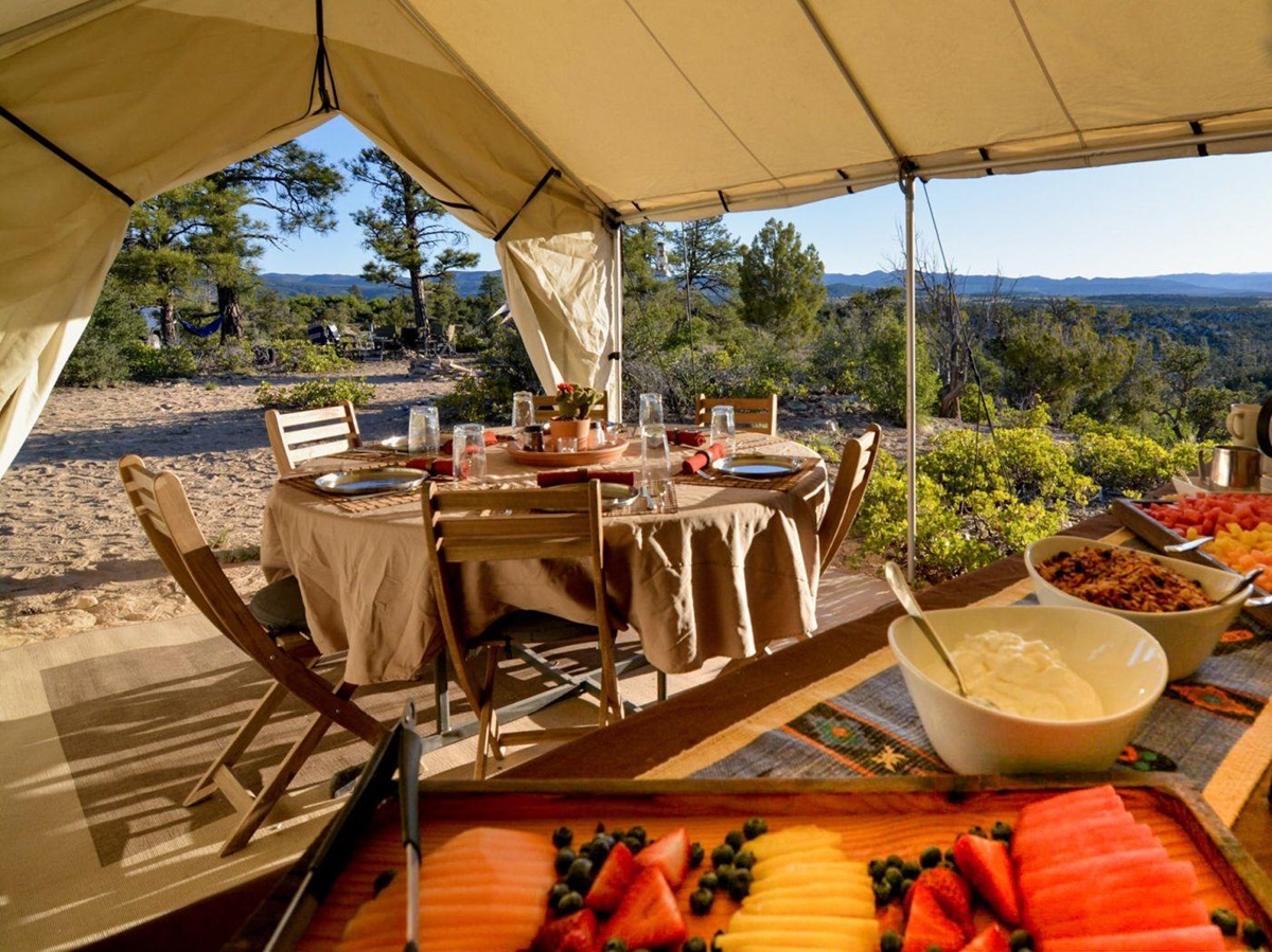 Buffet breakfast at a private campsite with panoramic views over Yellowstone National Park