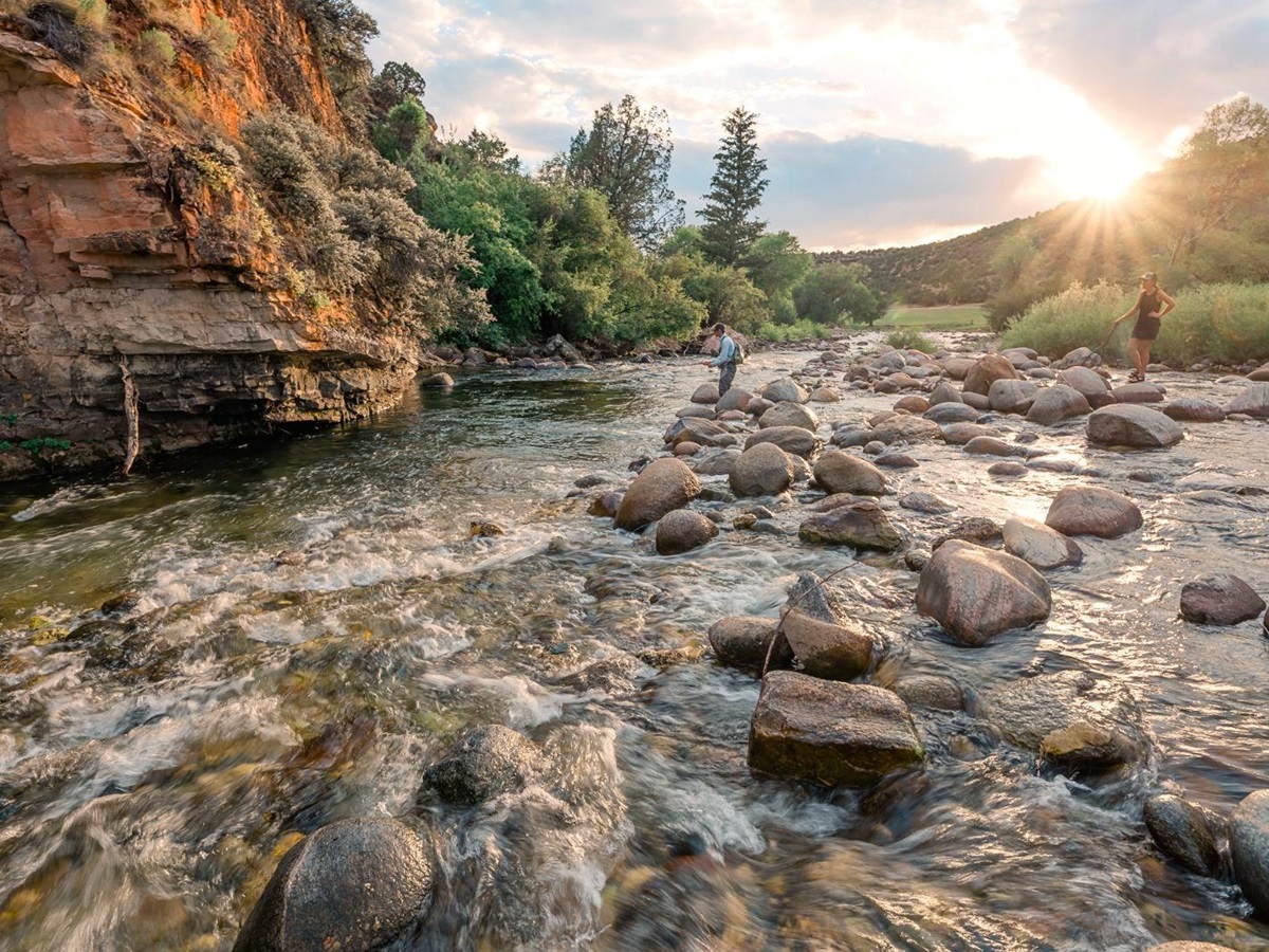 Fishing in the creek at Paintrock Canyon Ranch in Wyoming, photo: Brennan Cira