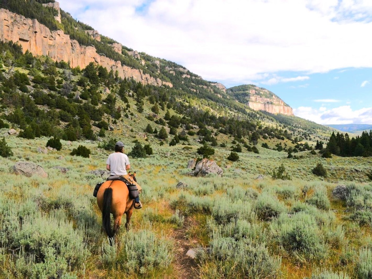 Riding on the grounds of Paintrock Canyon Ranch in Wyoming, photo: Lauren O'Toole