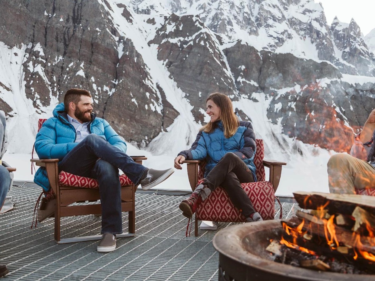 Warming drinks around the fire pit at Sheldon Chalet Alaska