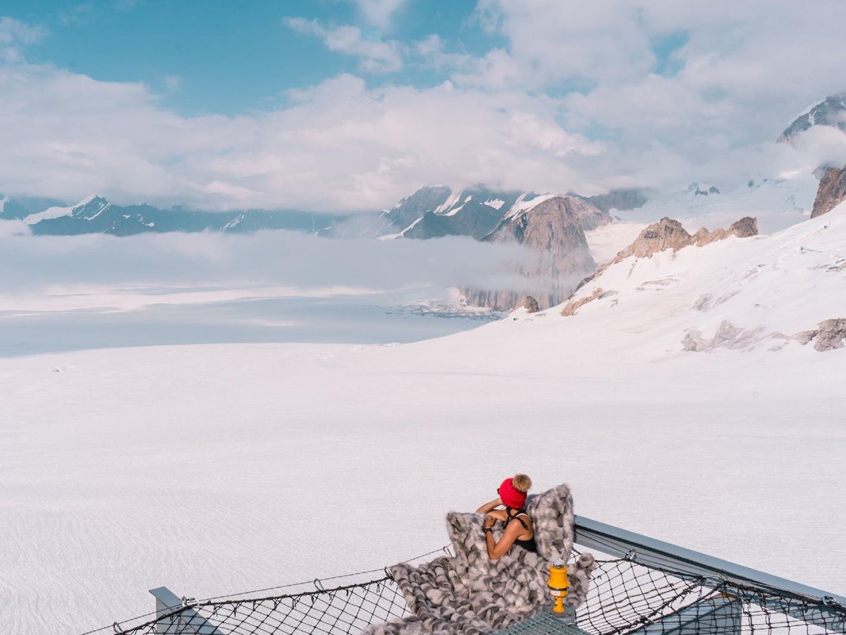 Viewing the Alaskan wilderness from a hammock at Sheldon Chalet