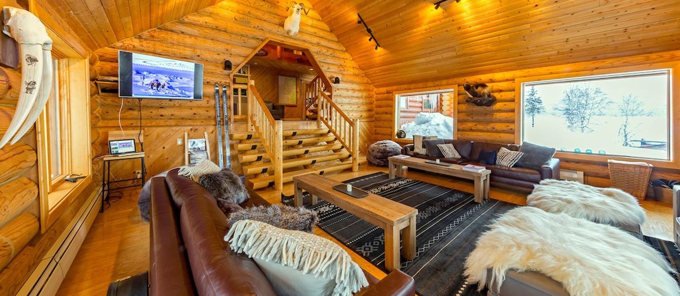 Cosy cabin lounge at Tordrillo Mountain Lodge Alaska