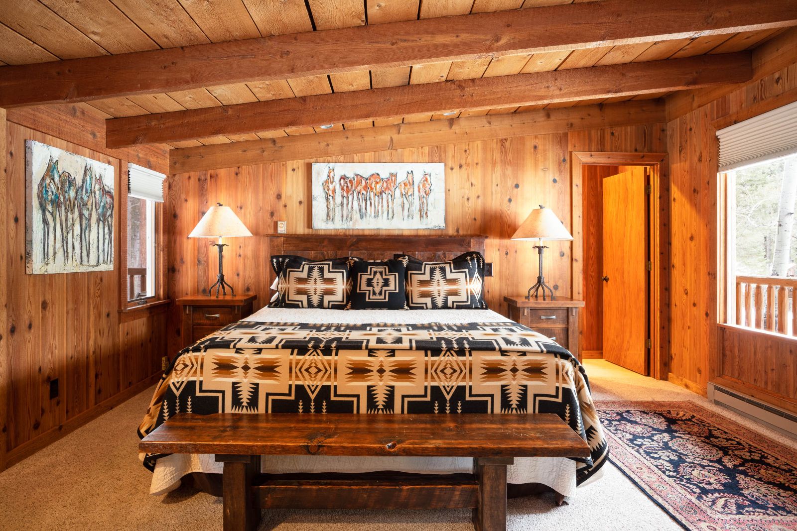Cedar Cabin guest bedroom at Triple Creek Ranch in Montana, USA