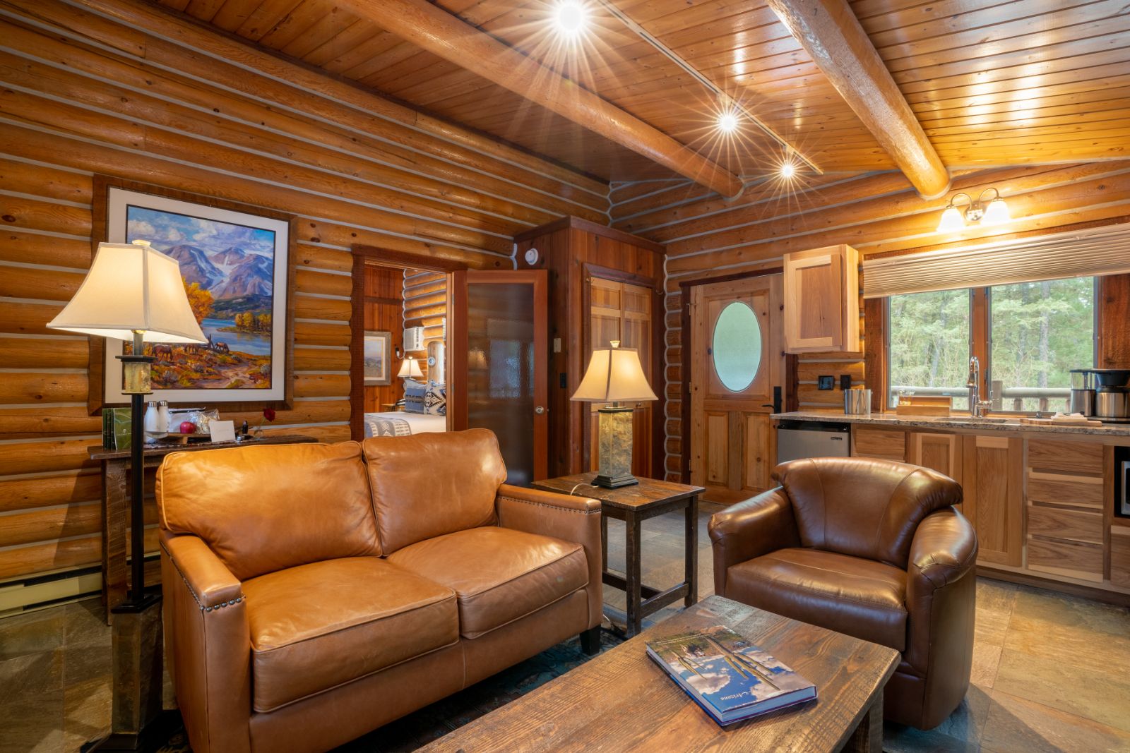 Trapper cabin living area at Triple Creek Ranch in Montana, USA