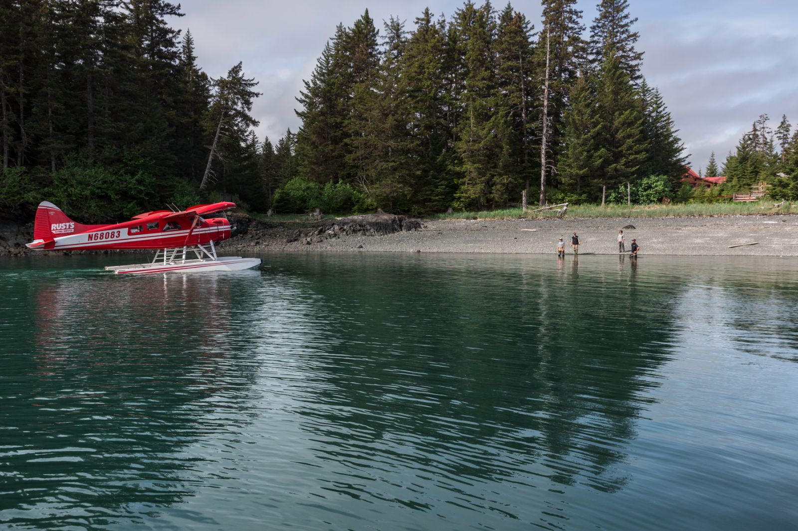 A float plane docked at Tutka Bay Lodge in Alaska, USA