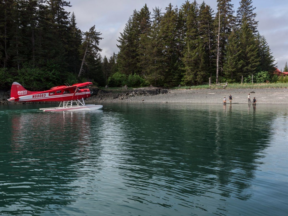 A float plane docked at Tutka Bay Lodge in Alaska, USA