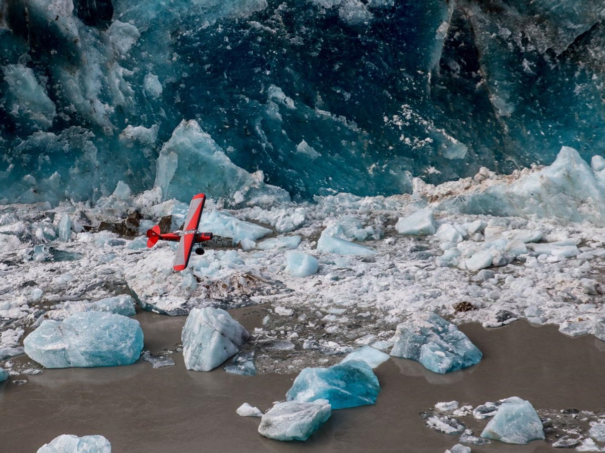Plane flying over a glacier near Ulitma Thule Lodge in Alaska's Wrangell-St Elias. National Park