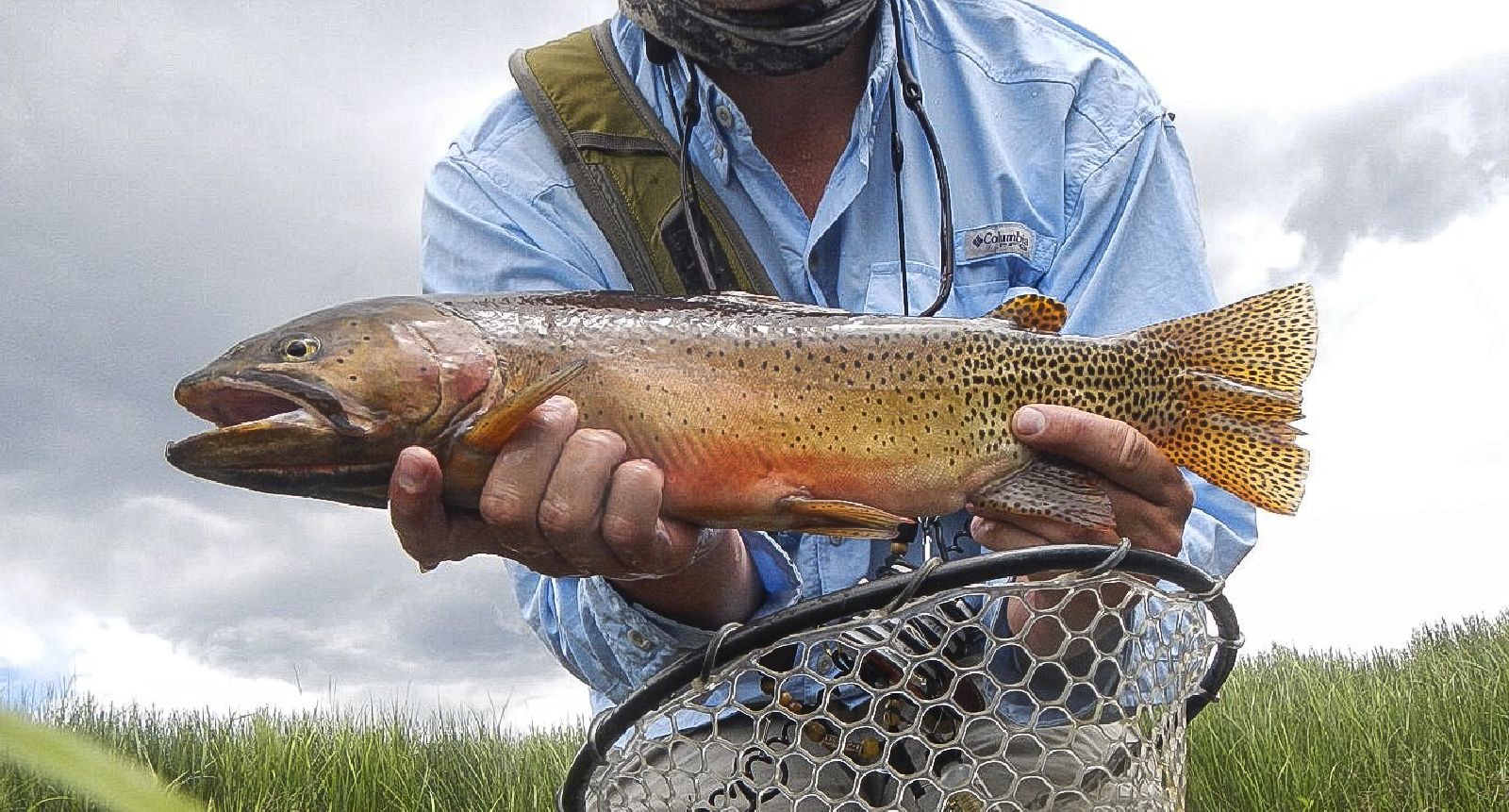 Guest enjoying fishing from Ted Turner's Vermejo reserve in New Mexico USA