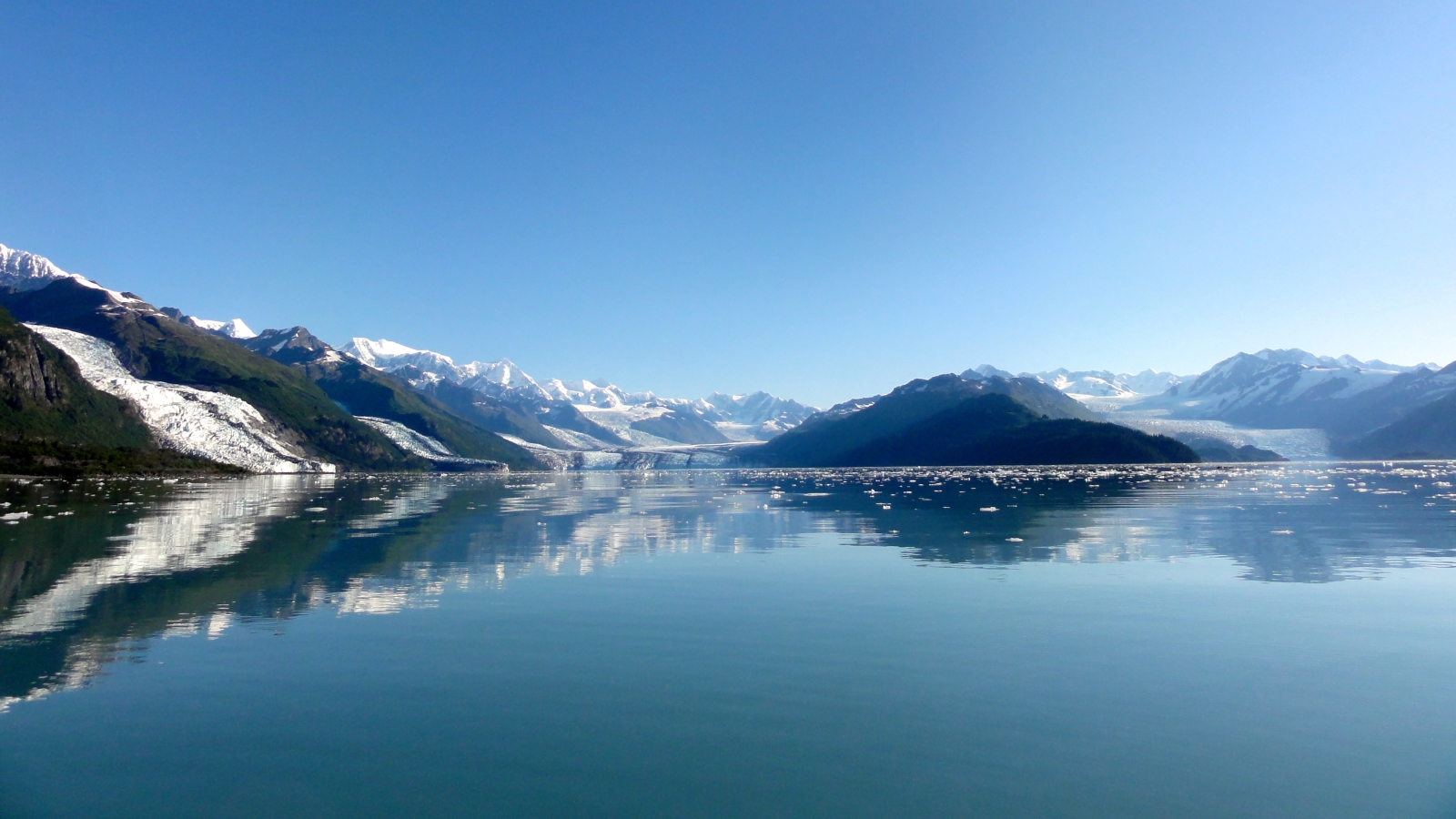 Large lake and snowy mountains in the background