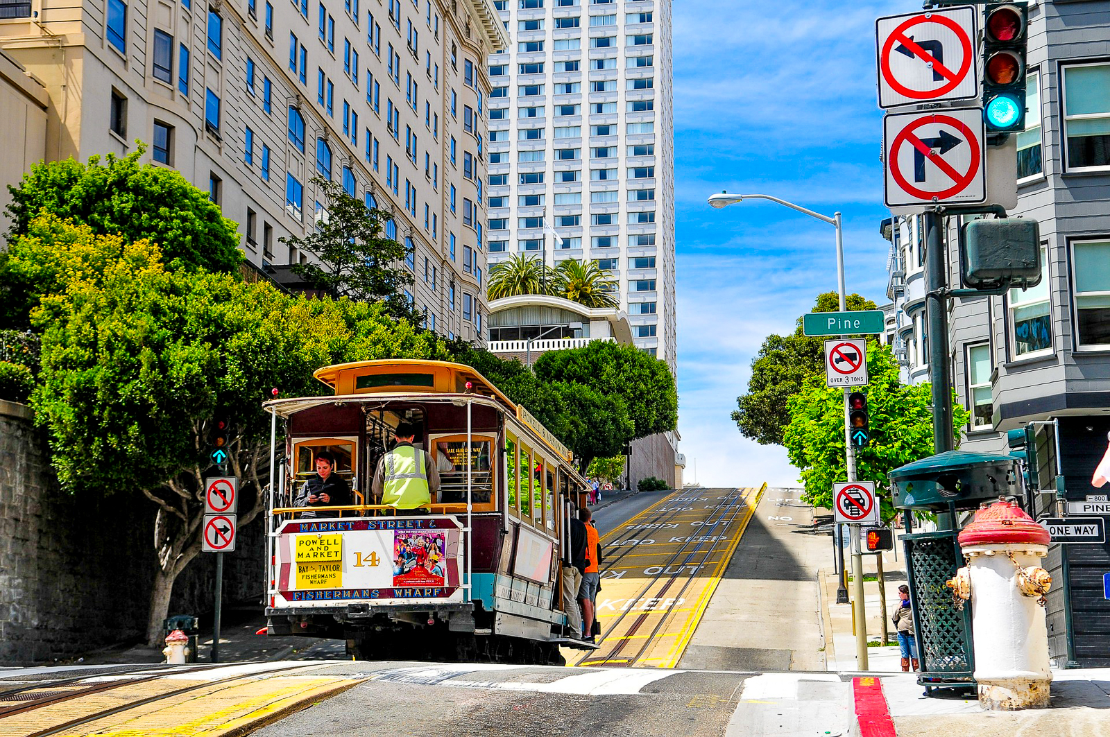 A tram riding through the streets of San Francisco