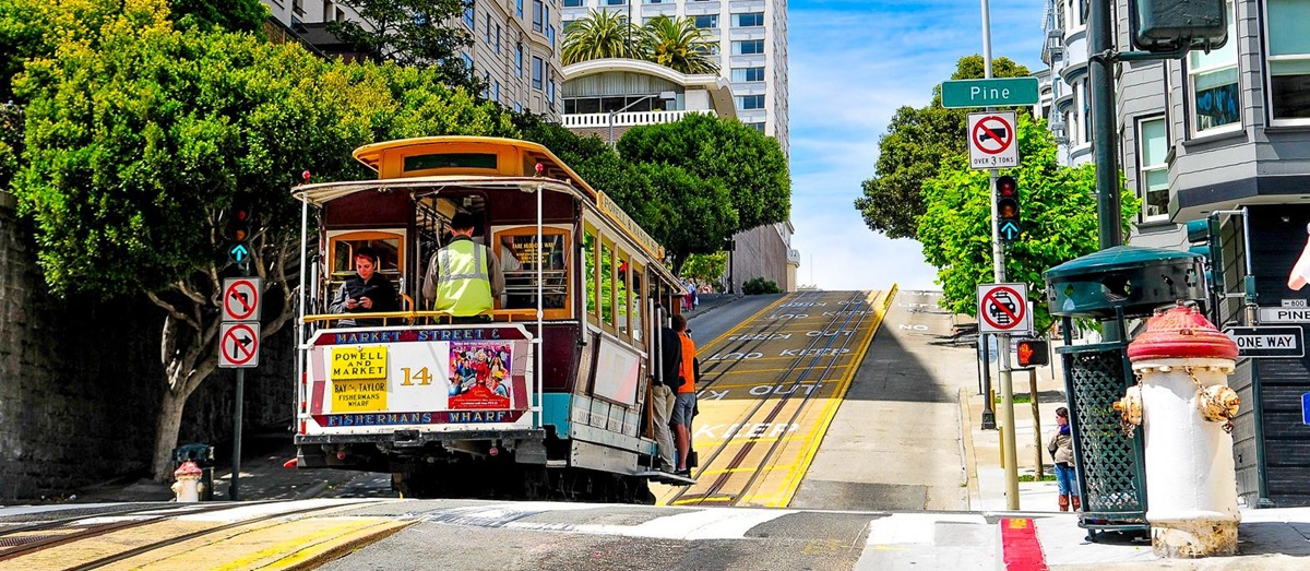 A tram riding through the streets of San Francisco