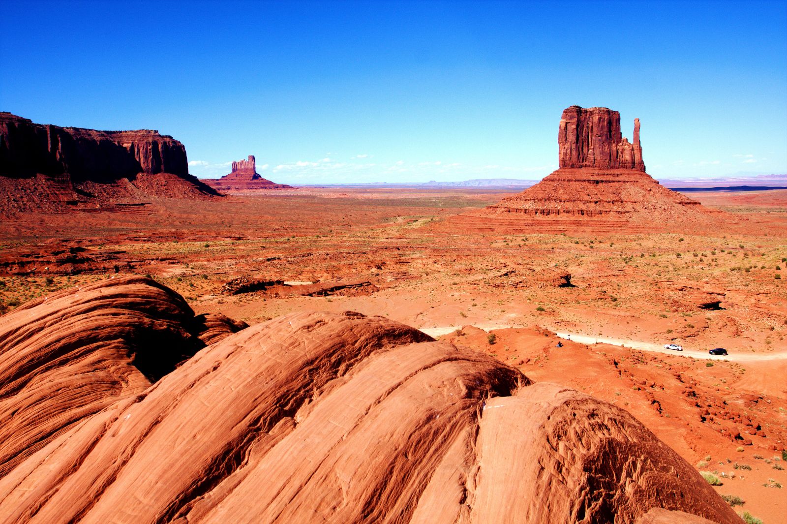 Red rock and distant view of the Monument Valley in Utah