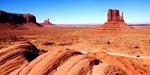 Red rock and distant view of the Monument Valley in Utah