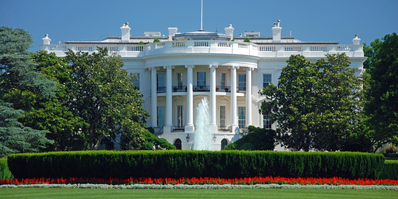 The White House in Washington, D.C. with flowers and fountain